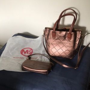 Michael Michelle Cross body .metallic copper color